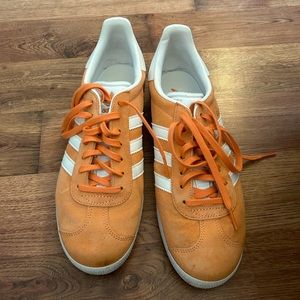 Orange Adidas Gazelle suede sneakers
